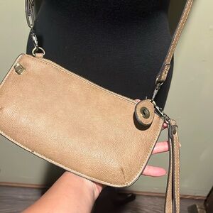 Joy Susan Brown Wristlet Clutch